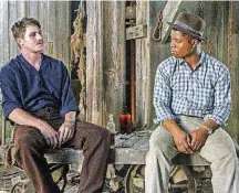  ?? DIETL, NETFLIX] [PHOTO PROVIDED BY STEVE ?? Garrett Hedlund, left, and Jason Mitchell in “Mudbound,” a film that might be passed over by Oscars voters in part because Netflix doesn’t follow the usual Hollywood distributi­on strategy.