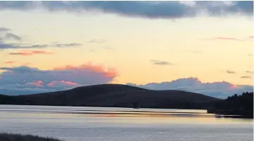  ?? ?? Thanks to Tricia Brown from Meigle for this picture she took of the dusk sunlight at the man-made Backwater Reservoir in Glen Isla, in north-west Angus.