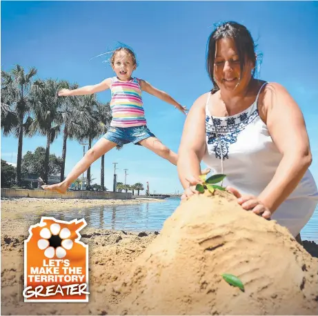  ?? Picture: PATRINA MALONE ?? Jorja Smart, 4, makes the most out of the limited activities at the waterfront lagoon with her mother, Trish LET’S MAKE THE TERRITORY