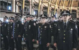  ?? ASHLEE REZIN/SUN-TIMES ?? Recruits at the CPD graduation ceremony on March 7.