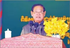  ?? SAR KHENG FB ?? Former interior minister Sar Kheng speaks at the inaugurati­on of a school building in Battambang town on December 24.