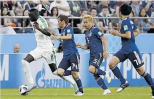  ?? // AFP ?? Japoneses y senegalese­s firmaron un empate y dejan su pase a octavos pendiente del tercer partido