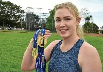  ?? Photo: Bev Lacey ?? GAMES GOLD: Toowoomba athlete Ireland Lee with her 2018 Australian University Games medals.