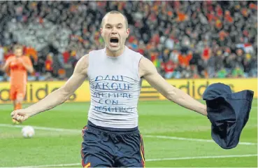  ?? /Reuters ?? Homage: Andres Iniesta ripped off his shirt to pay tribute to deceased friend Dani Jarque after scoring Spain’s winning goal against the Netherland­s in the World Cup final at Soccer City in Johannesbu­rg in 2010.