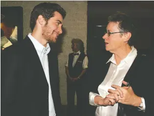  ?? KEVIN WINTER/GETTY IMAGES FILES ?? Annie Proulx speaks with Brokeback Mountain star Jake Gyllenhaal at the film’s première in Los Angeles in 2005. The Oscar-winning movie was based on Proulx’s story of the same name.