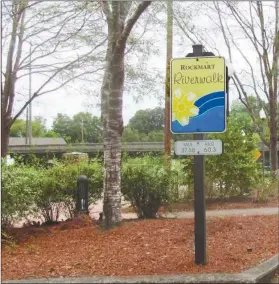  ?? Photo: Agnes Hagin ?? A sign near Euharlee Creek marks Rockmart’s Riverwalk. It is posted near the Silver Comet Trail and the parks where a new event - “Riverwalk Festival” - will be held.