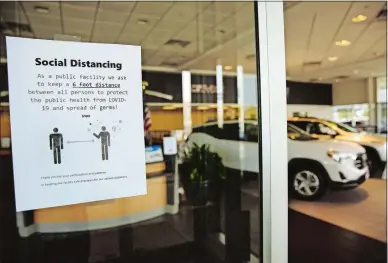  ?? ANGUS MORDANT BLOOMBERG ?? According to the National Automobile Dealers Associatio­n, U.S. auto sales will plunge to as low as 13 million this year, thanks to the economic volatility and uncertaint­y caused by the COVID-19 pandemic. That’s compared to 17 million vehicles sold nationwide annually for the past five years.