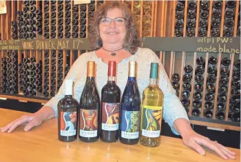  ?? ANNE SCHAMBERG ?? Kathy Jackson, the artistic half of Studio Winery, won a national award for her musically-themed wine labels.