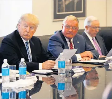  ?? Gerald Herbert Associated Press ?? DONALD TRUMP, shown at a meeting to discuss national security, has suggested using nuclear weapons against Islamic State. Some scholars say the jolt he has given the electorate could ultimately prove useful.