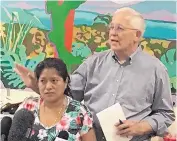  ?? ANGELA KOCHERGA/JOURNAL ?? A Guatemalan mother identified as Miriyam stands next to Ruben Garcia, director of Annunciati­on House, a shelter for immigrants in El Paso. She hopes to be reunited with her 4-year-old son. See story, Page A14.