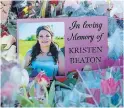  ??  ?? A photo of Kristen Beaton is displayed Sunday at a memorial in Debert, N.S. The care worker was shot and killed when a man went on a murder rampage in several Nova Scotia communitie­s, killing 22 people.