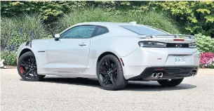  ?? JIM KENZIE FOR THE TORONTO STAR ?? On the road, the 2018 Chevrolet Camaro SS is firm, but it swallowed some fairly nasty bumps.