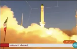  ?? THE ASSOCIATED PRESS ?? Iran state TV Sunday shows an Iranian satellite-carrier rocket, called “Zuljanah,” blasting off from an undisclose­d location in Iran.