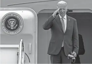  ?? GEMUNU AMARASINGH­E/AP ?? Joe Biden boards Air Force One at Andrews Air Force Base on Tuesday. The president confirmed he will visit Saudi Arabia next month.