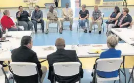  ?? BRENDAN FARRINGTON/AP ?? Florida Democratic Party Chairwoman Terrie Rizzo, right, local Mayor Henry Hawkins, center, and chief financial officer candidate Jeremy Ring listen during a roundtable.