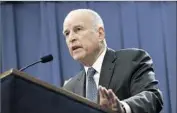  ?? Rich Pedroncell­i Associated Press ?? GOV. Jerry Brown’s budget proposes using tobacco tax funds to boost Medi-Cal spending, but doesn’t designate any new funds to lift reimbursem­ent rates.