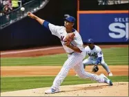  ?? Craig Ruttle / Associated Press ?? New York Mets’ Carlos Carrasco pitches in the first inning against the Giants on Thursday in New York.