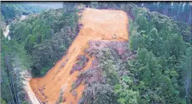  ??  ?? SLOW GOING: The size of the Lemon’s Hill slip is revealed in this drone shot as excavators cut benches to stabilise the hillside. Picture/NZTA