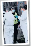  ??  ?? Probe Forensic officers at the Renfrew property