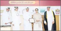  ?? ?? Sheikha Amthal Al Ahmad honors Al Khashti. Present are Al Asfar and Al Othman.