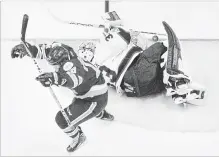  ?? JONATHAN HAYWARD THE CANADIAN PRESS ?? Acadie-Bathurst Titan forward Samuel Asselin celebrates his goal past Pats goalie Max Paddock in the third period of the Memorial Cup final in Regina on Sunday night. The Titan won the game, 3-0.