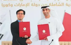  ?? ?? Dr. Thani Bin Ahmad Al Zeyoudi with Yeo Han-Koo during their meeting yesterday.