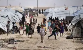  ?? Photograph: Baderkhan Ahmad/AP ?? Children playing outside their tents at al-Hawl camp in al-Hasakah province, Syria. Many only know the squalid conditions of the camp.