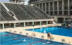  ?? New York Times ?? The swimming pool in Olympic Stadium in Berlin. There are now regulation­s on how many swimmers can be in the pool at once.