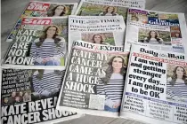  ?? AFP PHOTO ?? IN THE NEWS
The front pages of some of the United Kingdom’s national newspapers, dominated by stories about Catherine, Princess of Wales, announcing her cancer diagnosis, in Amersham town, England, on Saturday, March 23, 2024.