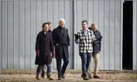  ?? ANDREW HARNIK — THE ASSOCIATED PRESS ?? President Joe Biden tours Dutch Creek Farms in Northfield, Minn., on Wednesday.
