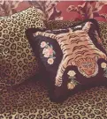  ??  ?? Tibetan Tiger Black Cushion, £43, Paloma Home, other furnishing­s from a selection, Paloma Home and Sofology