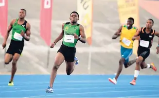  ?? RICARDO MAKYN/ MULTIMEDIA PHOTO EDITOR ?? Calabar High’s Christophe­r Taylor (second left) winning the Under-20 boys 400 metres in 45.82 seconds at yesterday’s Digicel Grand Prix Finals at the National Stadium.