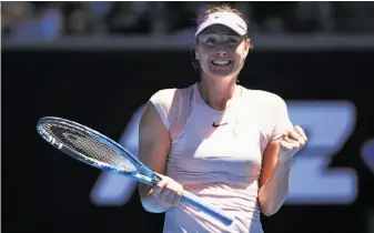  ?? Clive Brunskill / Getty Images ?? Maria Sharapova celebrates winning her first-round match over Germany’s Tatjana Maria. Sharapova is one of two Australian Open champions in the women’s field.