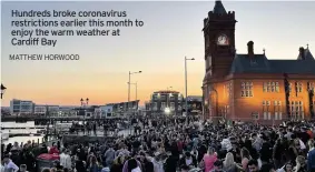  ?? MATTHEW HORWOOD ?? Hundreds broke coronaviru­s restrictio­ns earlier this month to enjoy the warm weather at Cardiff Bay