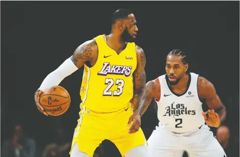  ?? GARY A. VASQUEZ / USA TODAY FILE ?? Los Angeles has two teams with superstars who could lead them to an NBA title this season — the Lakers in Lebron
James and the Clippers in Kawhi Leonard. Both teams could struggle to be in that position again right away.