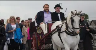  ??  ?? Nedeen’s brother Derry took the reins this time in bringing Brendan Grace over the bridge from Hare Street into Blennervil­le in the most fitting tribute possible to the late Annagh native.