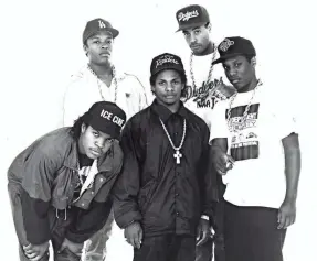  ??  ?? “Straight Outta Compton” brought N.W.A – Ice Cube, left, Dr. Dre, Eazy-E, Yella, and M.C. Ren – into the spotlight 30 years ago.