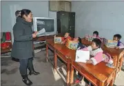  ?? WANG HAOFEI / FOR CHINA DAILY ?? Pupils at the charity Hope School in rural Changchun. The city government is helping poor children receive school education and NGOs are also keen to help.