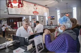  ?? ?? Joe Prestejohn, long-time owner of Cabot’s Ice Cream in Newton, said he first started working behind the counter at age 11. He’s “tired” and ready to retire.