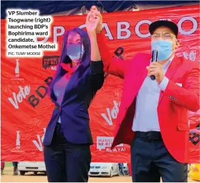  ?? PIC: TUMY MODISE ?? VP Slumber Tsogwane (right) launching BDP’s Bophirima ward candidate, Onkemetse Mothei