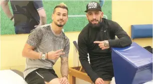  ?? (Twitter) ?? IRANIAN NATIONAL TEAM captain Ashkan Dejagah (right) points at ‘my friend’ Maor Buzaglo in this photo posted on social media Sunday.