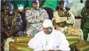  ?? MARCO LONGARI/AFP ?? This photo taken on November 29, shows Gambian President Yahya Jammeh looking on in Banjul, during the closing rally of the electoral campaign of the Alliance for Patriotic Reorientat­ion and Constructi­on (APRC).