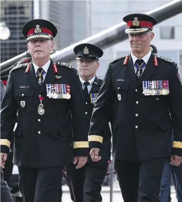  ?? JUSTIN TANG / THE CANADIAN PRESS FILES ?? Lt.-Gen. Jean-Marc Lanthier, right, has spoken with his commanders about adhering to the Armed Forces’ code of ethics, and setting a personal example.