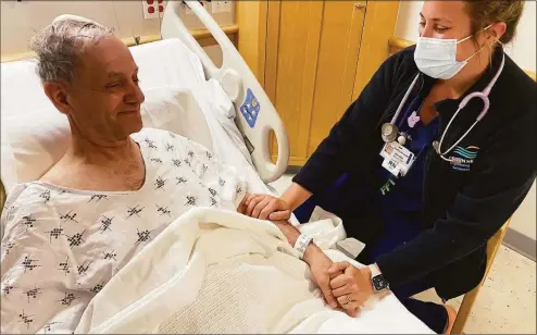  ?? Brian Gioiele / Hearst Connecticu­t Media ?? Griffin Hospital was recently recognized by Newsweek — for the fourth consecutiv­e year — as one of the World’s Best Hospitals. Above, nurse Jen Iacuone speaks with Gary Sartori.