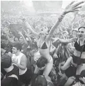 ?? JIM RASSOL/SUN SENTINEL ?? Thousands descend on downtown Miami for Ultra Music Festival 2015.