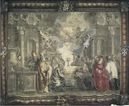  ??  ?? A tapestry that depicts the institutio­n of the feast of Corpus Christi