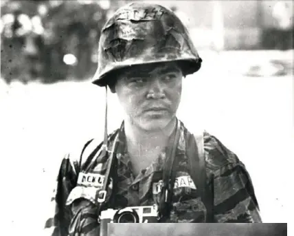  ?? ?? AP
Above: This undated photo shows Associated Press photojourn­alist Nick Ut in South Vietnam. Minutes after a South Vietnamese plane accidental­ly dropped napalm on its own troops and civilians in Trang Bang village on June 8, 1972, Ut made the iconic photograph of 9year-old Kim Phuc running naked and crying on a road leading away from the village.