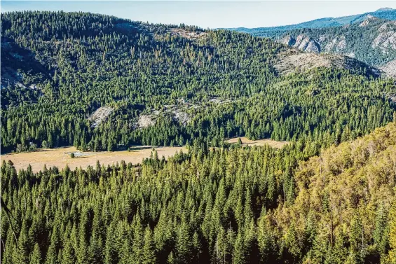  ?? Photos by Andri Tambunan/Special to the Chronicle ?? Bear Valley at Emigrant Gap is shown. The 40 Acre Conservati­on League soon will close on a 650-acre expanse in the Emigrant Gap area in Placer County.