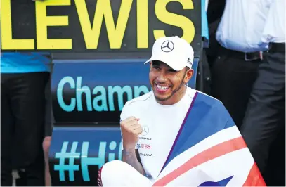  ?? Picture: AFP ?? STILL THE BEST. Britain’s Lewis Hamilton celebrates after claiming his fifth Formula 1 world title when he finished fourth at the Mexican Grand Prix at Autodromo Hermanos Rodriguez on Sunday.