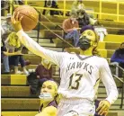  ?? APRIL GAMIZ/THE MORNING CALL ?? Bethlehem Catholic’s Kourtney Wilson goes in for a layup Wednesday against Shikellamy’s Paige Fausey, left, and Averi Dodge.